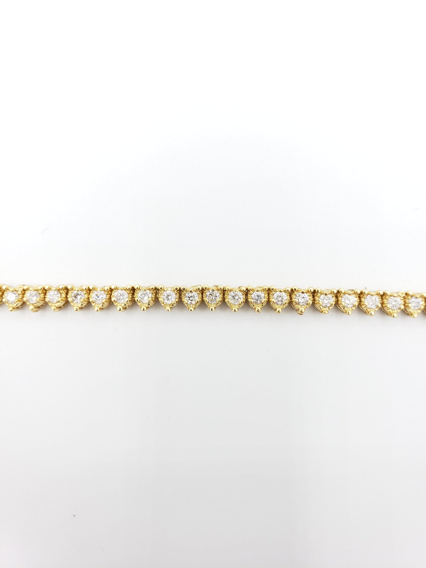 14K Gold- Diamond Pointer Tennis Chain 40.3 Grams