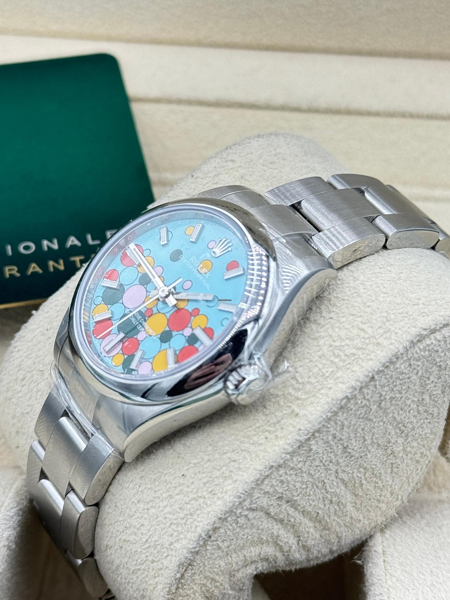 Rolex Oyster Perpetual 31 Watch - Domed Bezel - Turquoise Blue Celebration Motif Index Dial - Oyster Bracelet - 277200