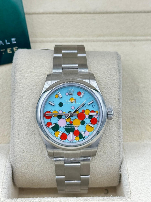 Rolex Oyster Perpetual 31 Watch - Domed Bezel - Turquoise Blue Celebration Motif Index Dial - Oyster Bracelet - 277200