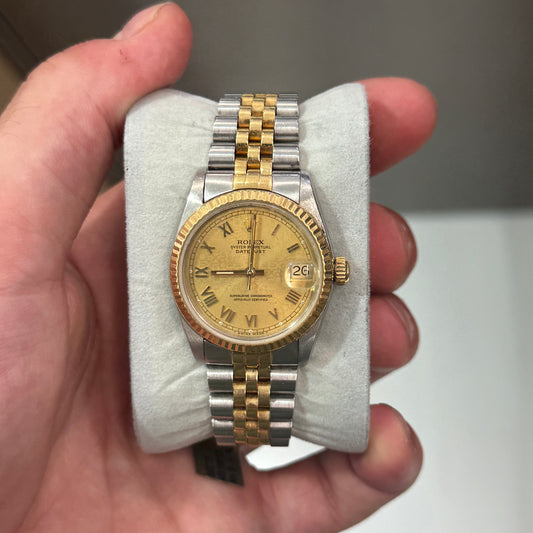 Rolex 68273 Champagne Roman Dial on Jubilee